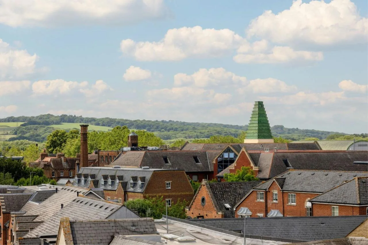 a city with a steeple in the background at Courtyard by Marriott Oxford City Centre in Oxford